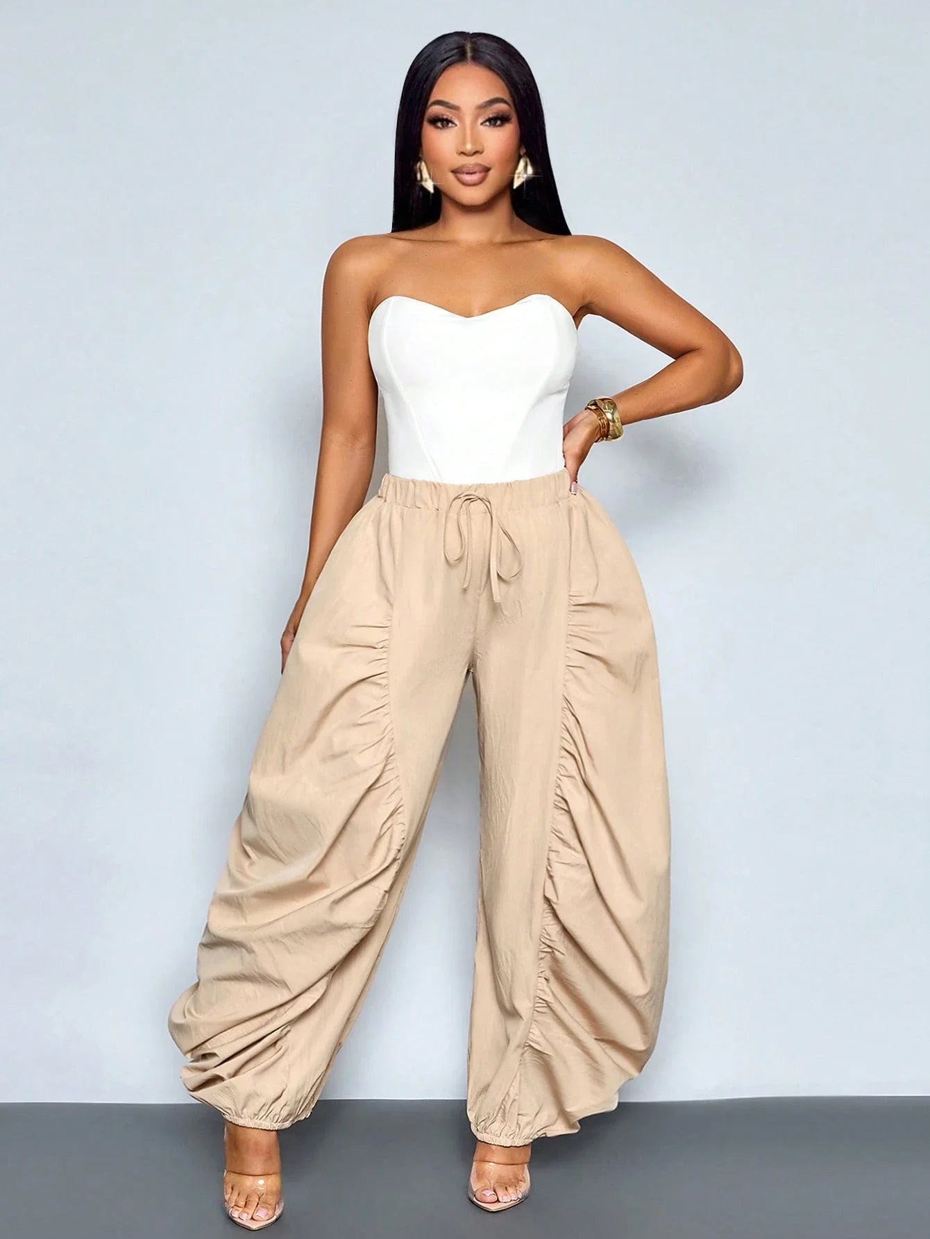 Women's Beige Loose Wide Leg Pleated Casual Pants With Drawstring Waist And Pockets by MadisonnSavannahBoutique