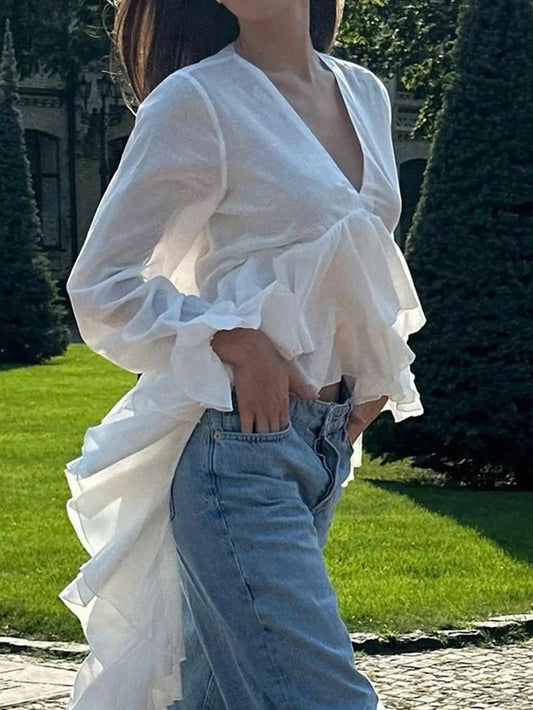 V-Neck Long Sleeve Ruffle Hem Top by MadisonnSavannahBoutique