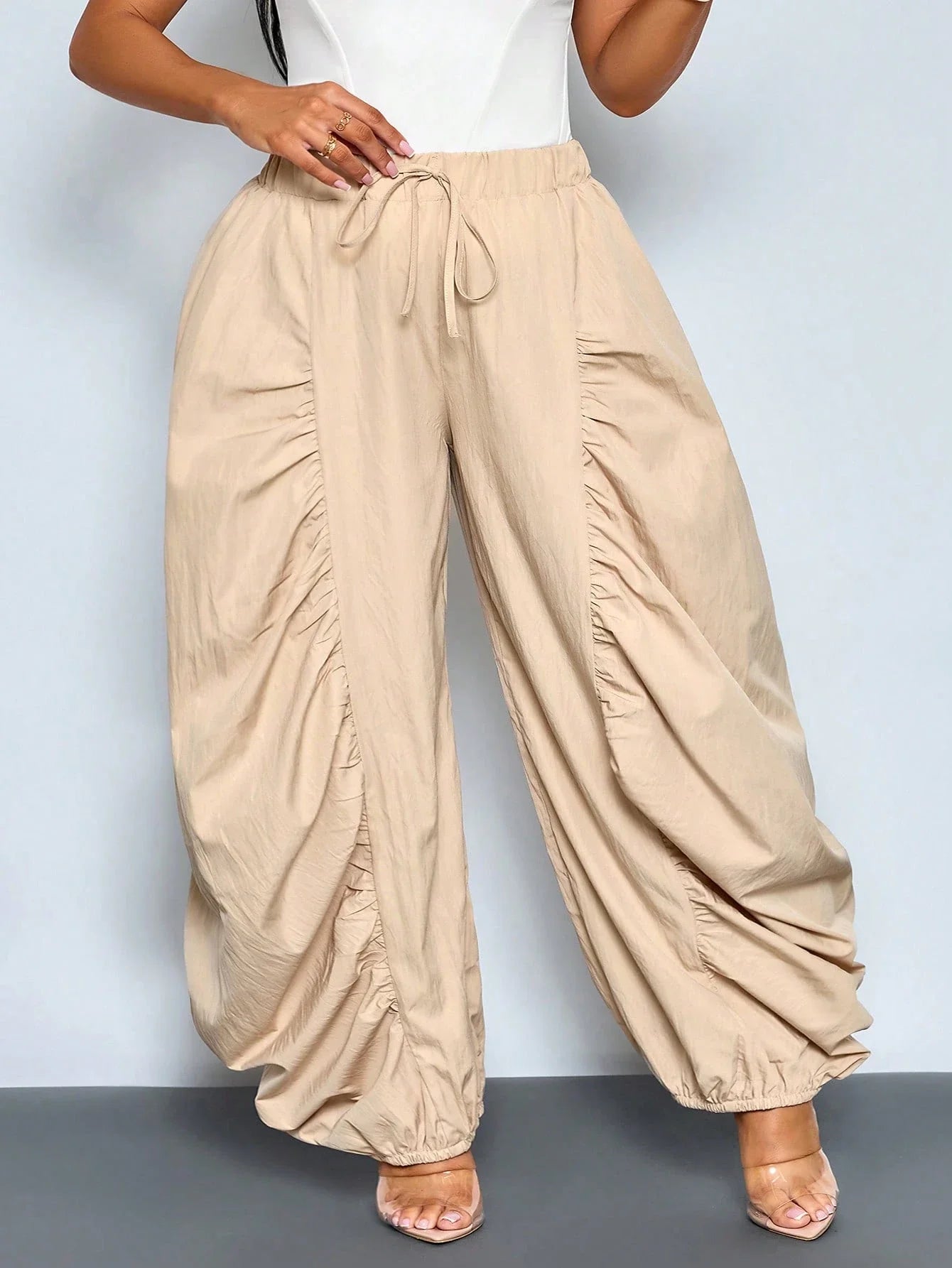 Women's Beige Loose Wide Leg Pleated Casual Pants With Drawstring Waist And Pockets by MadisonnSavannahBoutique