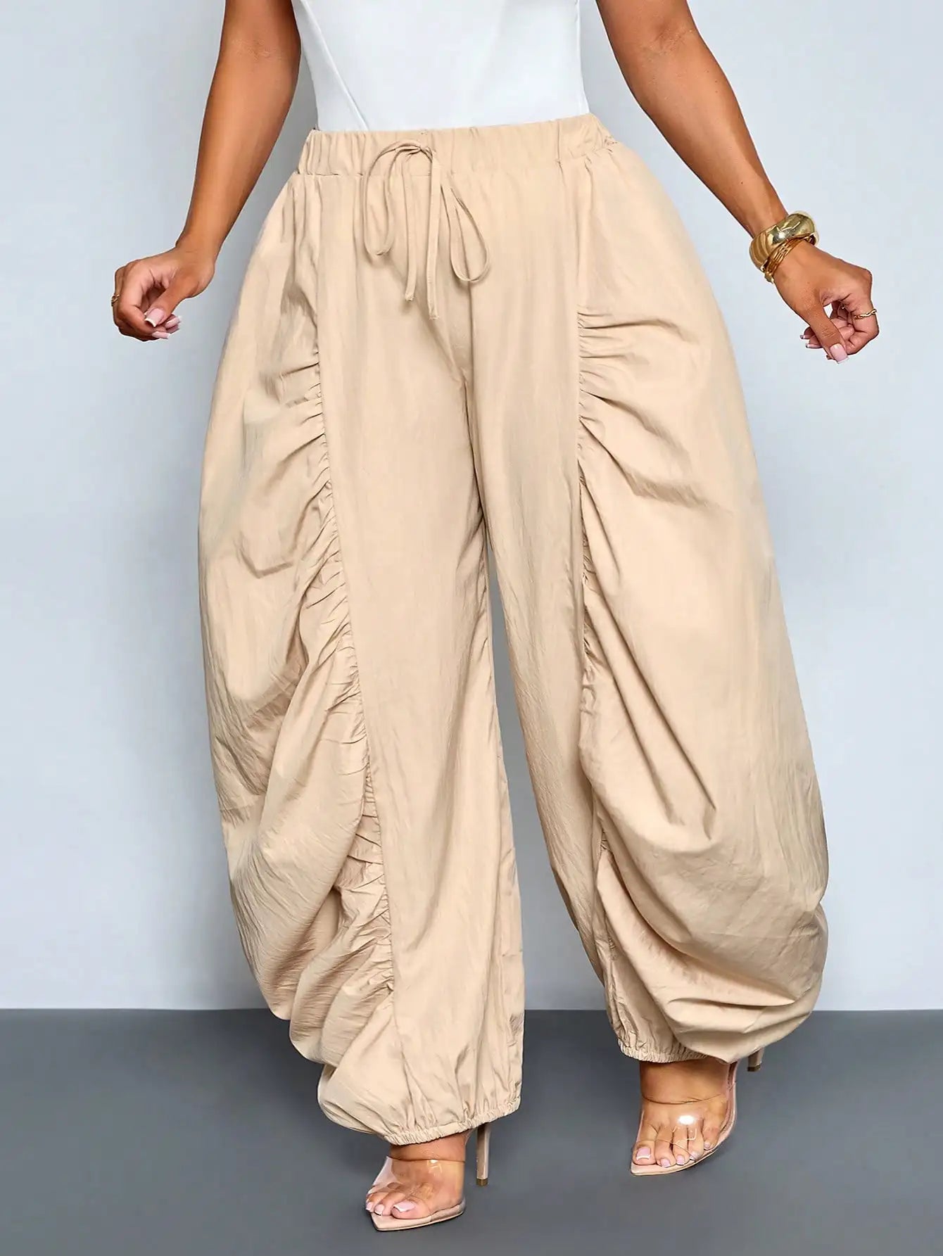 Women's Beige Loose Wide Leg Pleated Casual Pants With Drawstring Waist And Pockets by MadisonnSavannahBoutique