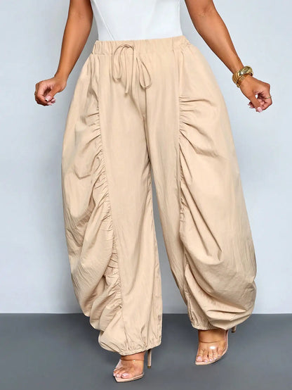 Women's Beige Loose Wide Leg Pleated Casual Pants With Drawstring Waist And Pockets by MadisonnSavannahBoutique