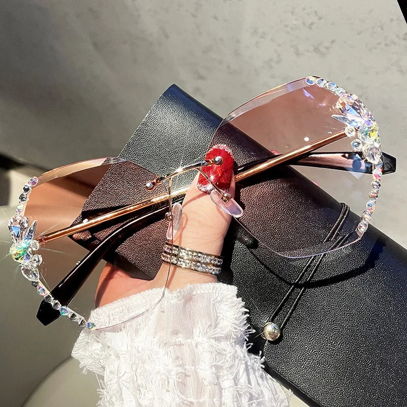 Y2K slim crystal rimless sunglasses. by MadisonnSavannahBoutique