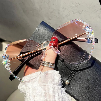 Y2K slim crystal rimless sunglasses. by MadisonnSavannahBoutique