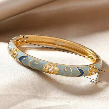 Stainless Steel Multicolor Enamel Flower Bangle by MadisonnSavannahBoutique
