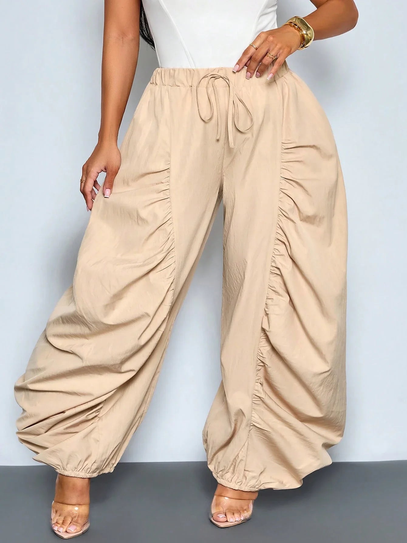 Women's Beige Loose Wide Leg Pleated Casual Pants With Drawstring Waist And Pockets by MadisonnSavannahBoutique
