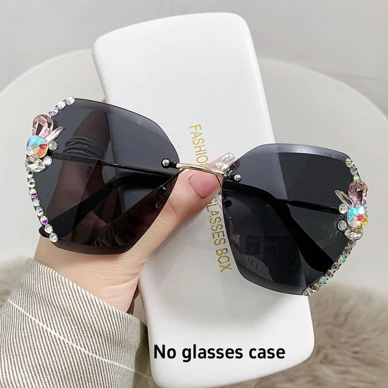 Y2K slim crystal rimless sunglasses. by MadisonnSavannahBoutique