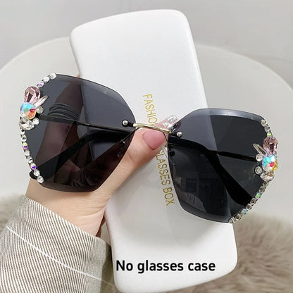 Y2K slim crystal rimless sunglasses. by MadisonnSavannahBoutique