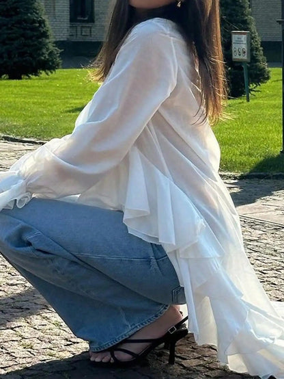 V-Neck Long Sleeve Ruffle Hem Top by MadisonnSavannahBoutique