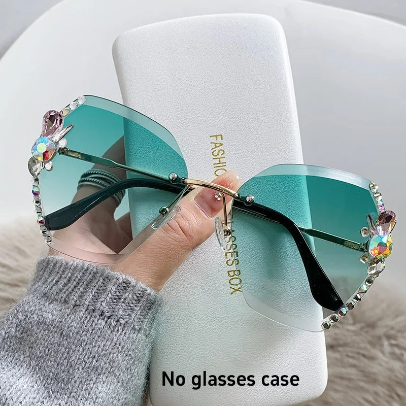Y2K slim crystal rimless sunglasses. by MadisonnSavannahBoutique