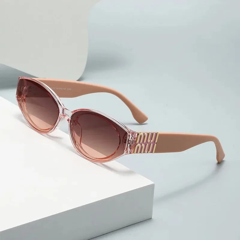 Luxury Women's Small Oval Sunglasses by MadisonnSavannahBoutique