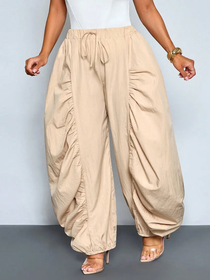 Women's Beige Loose Wide Leg Pleated Casual Pants With Drawstring Waist And Pockets by MadisonnSavannahBoutique