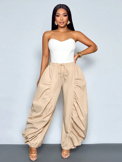 Women's Beige Loose Wide Leg Pleated Casual Pants With Drawstring Waist And Pockets by MadisonnSavannahBoutique
