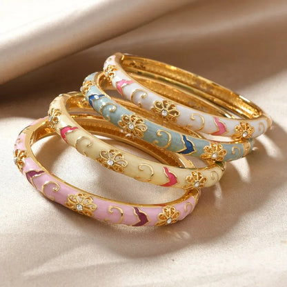Stainless Steel Multicolor Enamel Flower Bangle by MadisonnSavannahBoutique