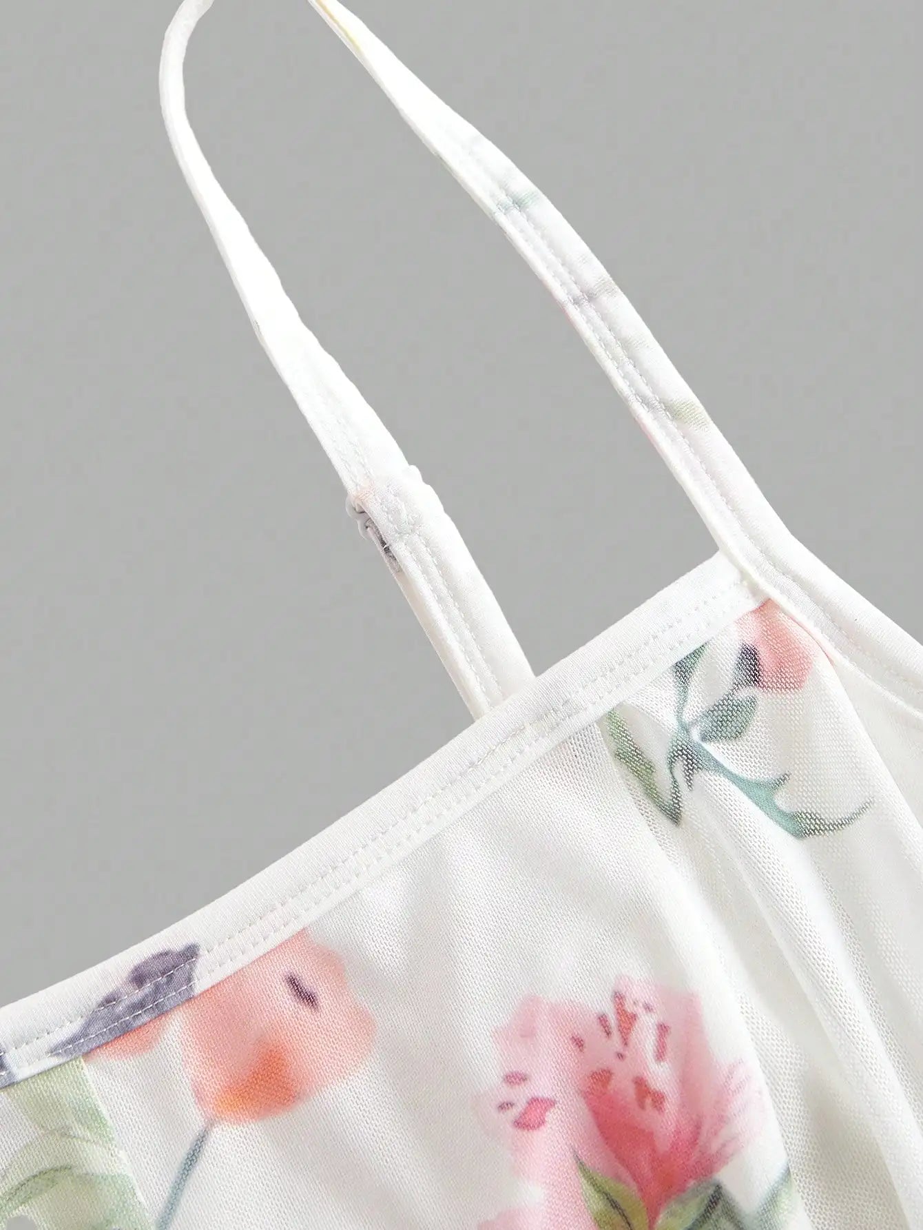 Elegant White Floral A-Line Maxi Dress With Spaghetti Straps And Waist Tie by MadisonnSavannahBoutique
