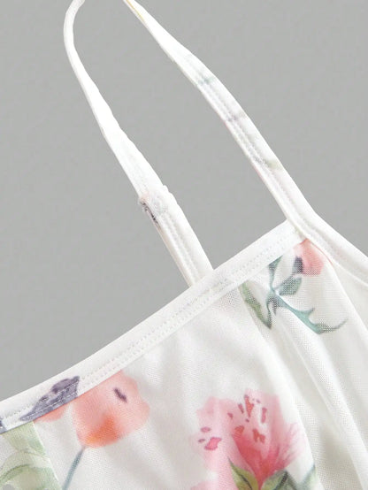 Elegant White Floral A-Line Maxi Dress With Spaghetti Straps And Waist Tie by MadisonnSavannahBoutique