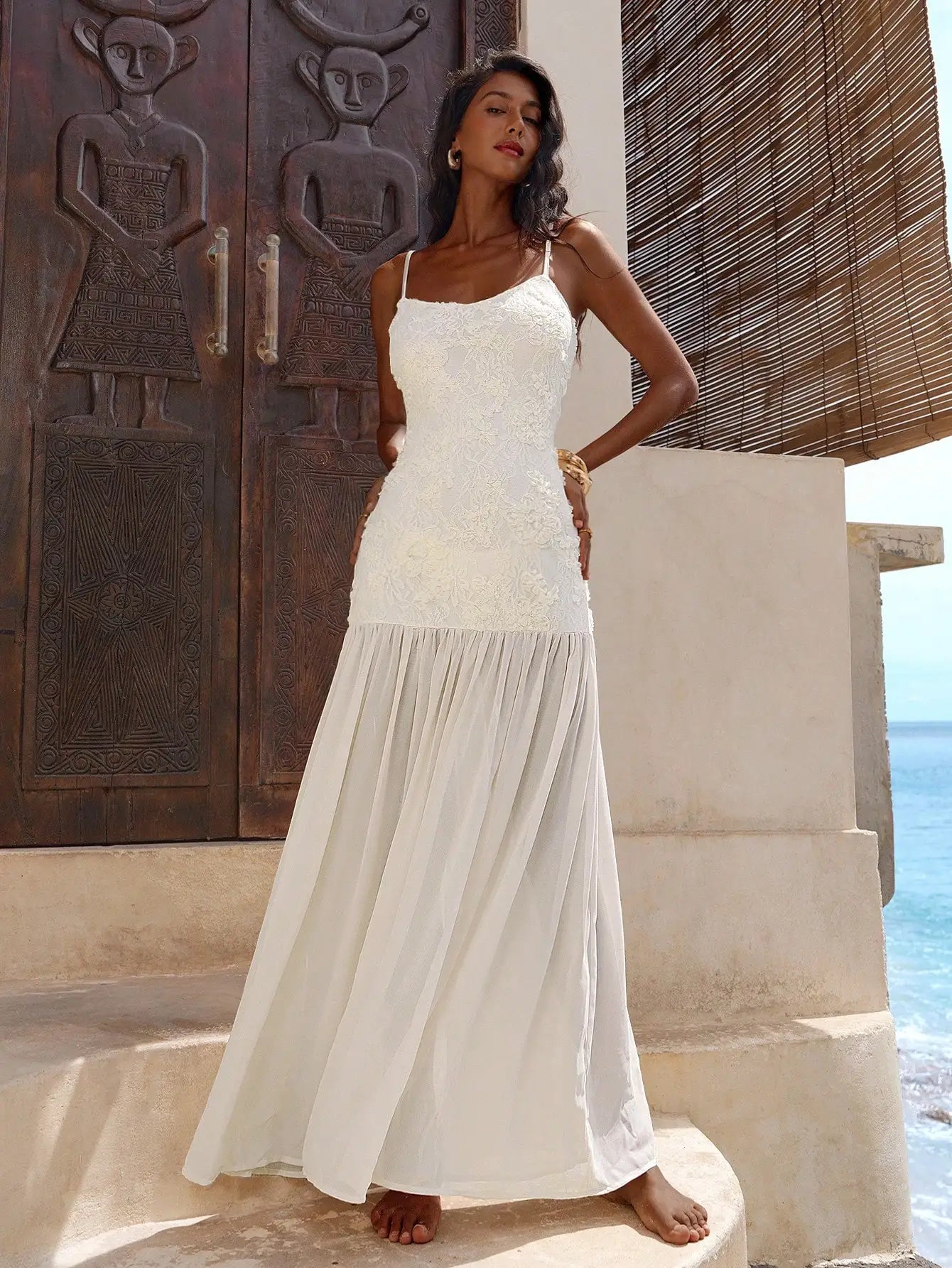 Elegant White Lace Maxi Dress With Spaghetti Straps Flared Hem by MadisonnSavannahBoutique