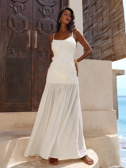 Elegant White Lace Maxi Dress With Spaghetti Straps Flared Hem by MadisonnSavannahBoutique