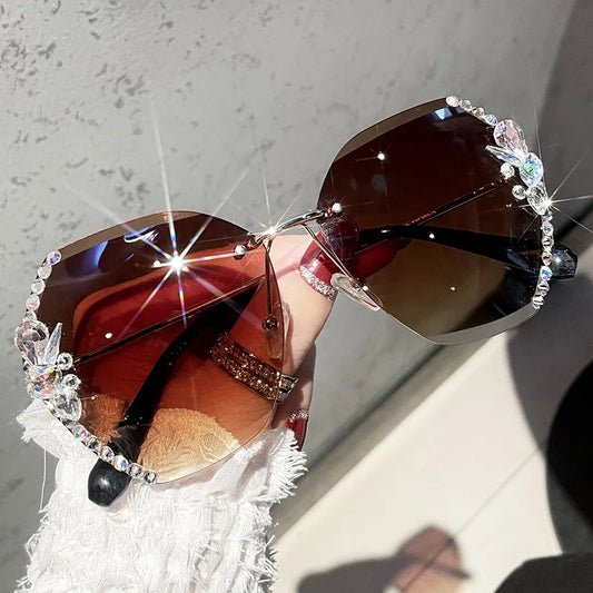 Y2K slim crystal rimless sunglasses. by MadisonnSavannahBoutique