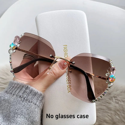 Y2K slim crystal rimless sunglasses. by MadisonnSavannahBoutique