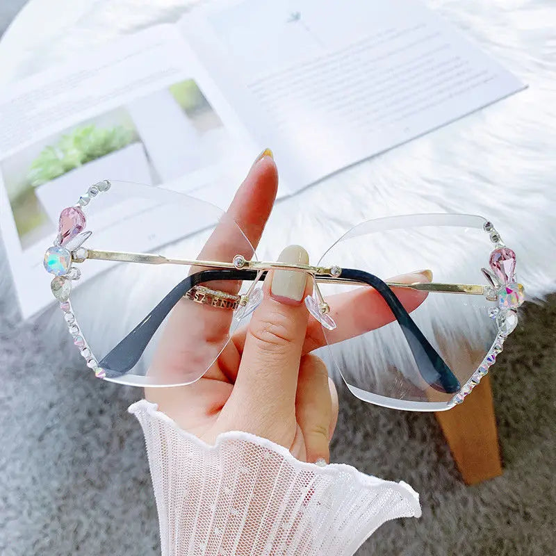 Y2K slim crystal rimless sunglasses. by MadisonnSavannahBoutique