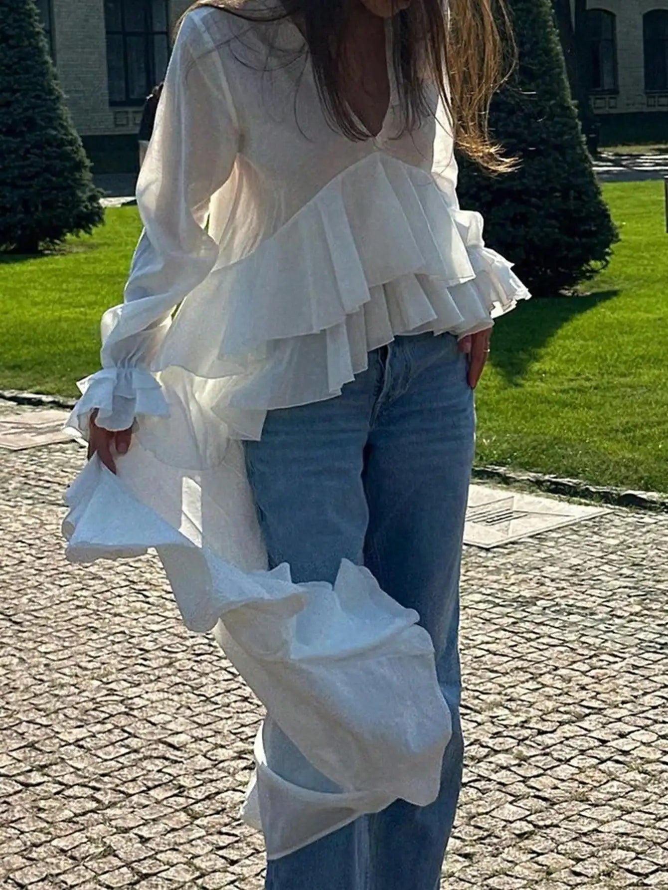 V-Neck Long Sleeve Ruffle Hem Top by MadisonnSavannahBoutique