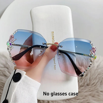 Y2K slim crystal rimless sunglasses. by MadisonnSavannahBoutique
