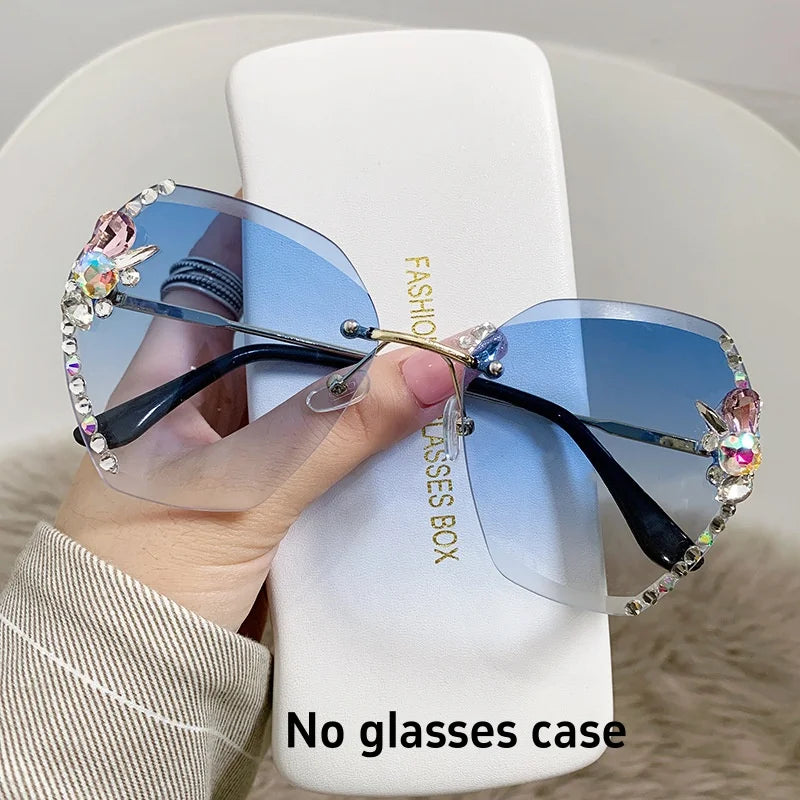 Y2K slim crystal rimless sunglasses. by MadisonnSavannahBoutique