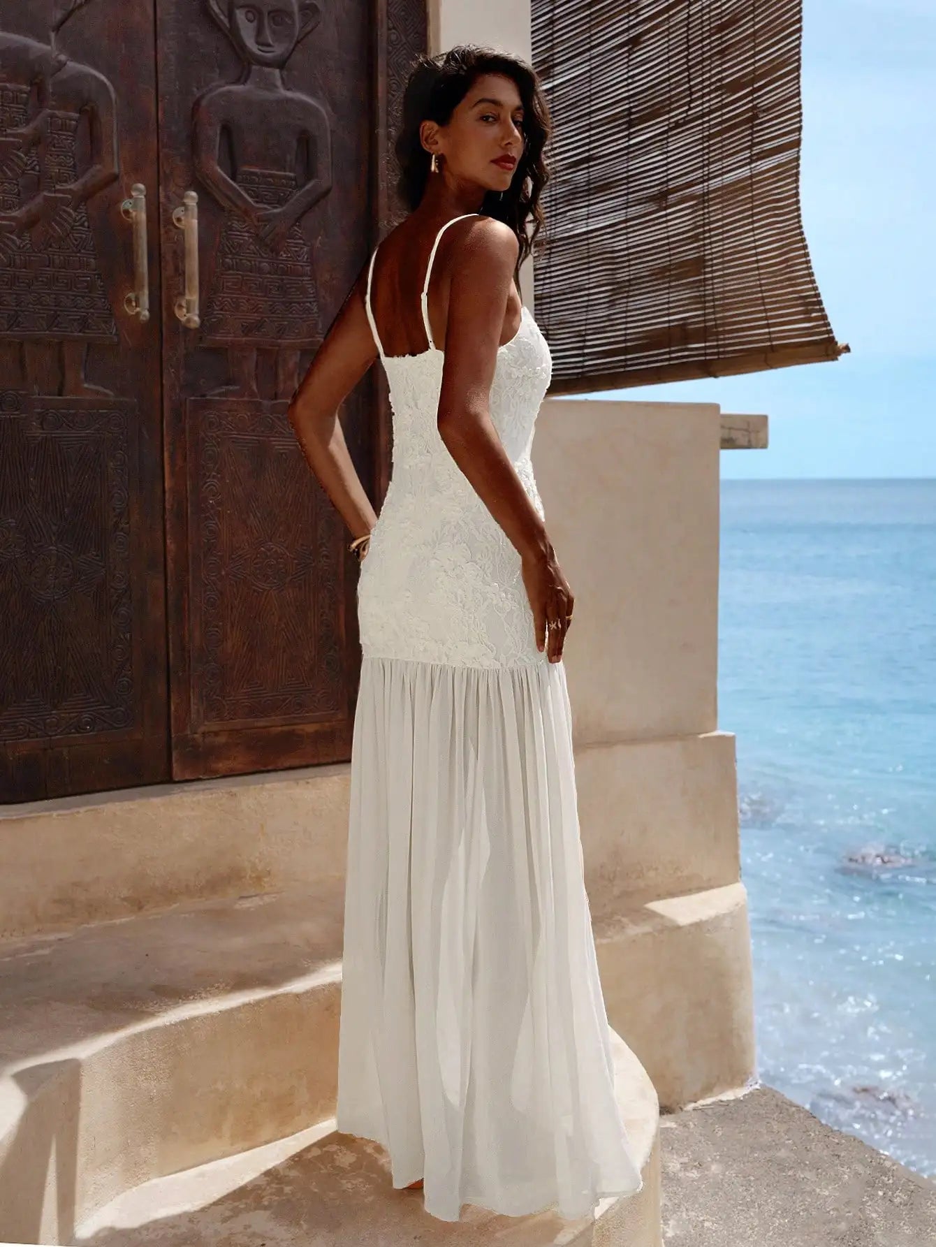 Elegant White Lace Maxi Dress With Spaghetti Straps Flared Hem by MadisonnSavannahBoutique