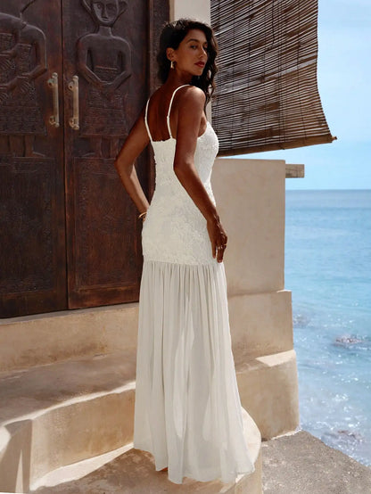 Elegant White Lace Maxi Dress With Spaghetti Straps Flared Hem by MadisonnSavannahBoutique