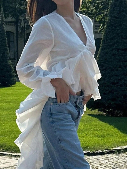 V-Neck Long Sleeve Ruffle Hem Top by MadisonnSavannahBoutique